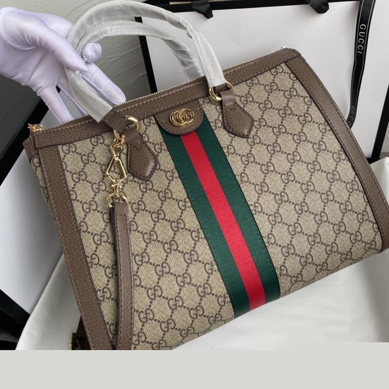 G*u*i top handle bags